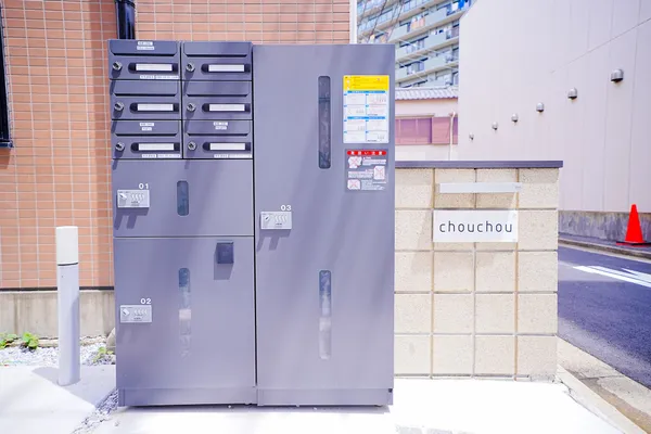 chouchou sign and mailboxes marking the alley entrance