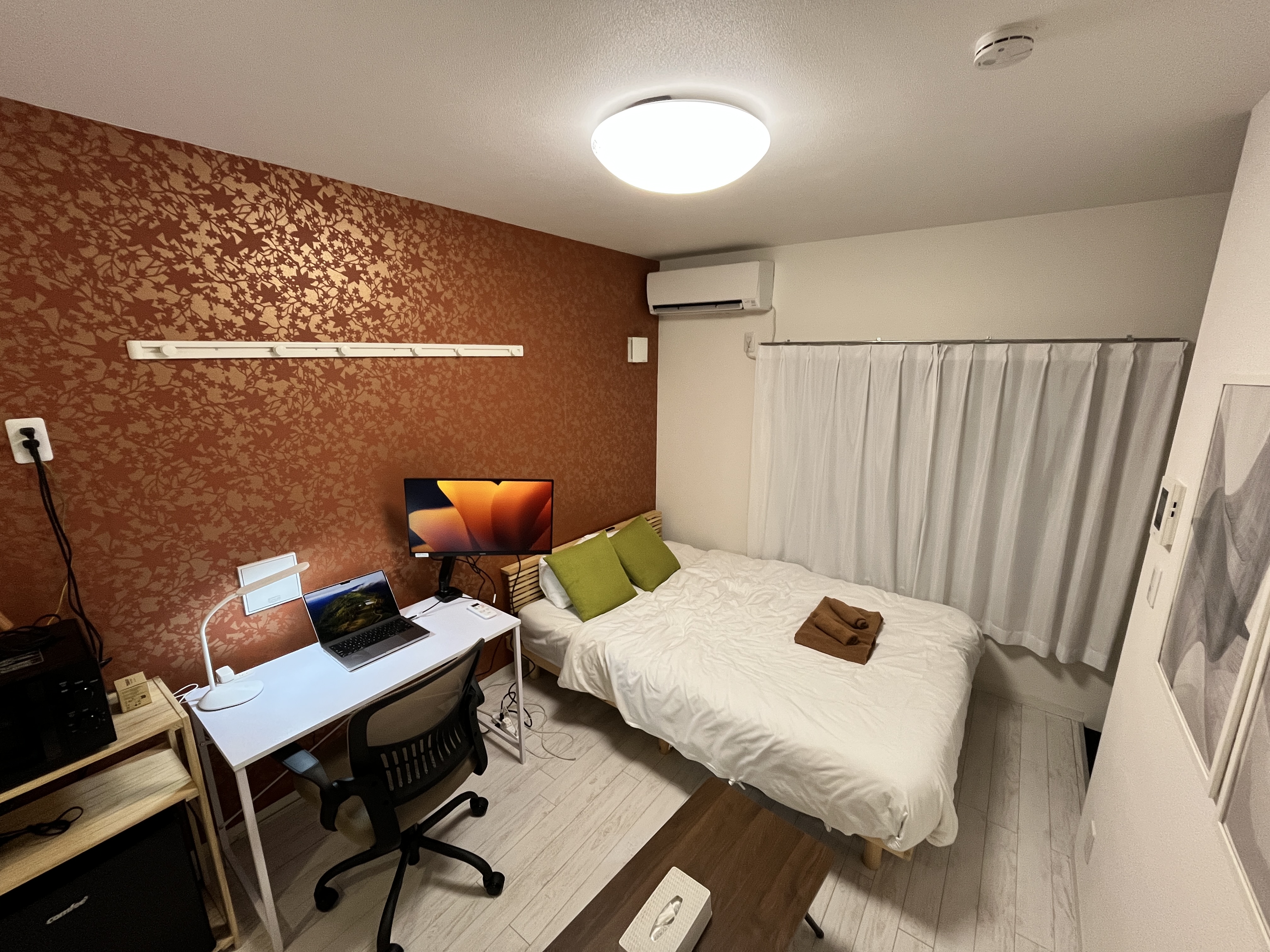 Sunset room - work desk with laptop and monitor